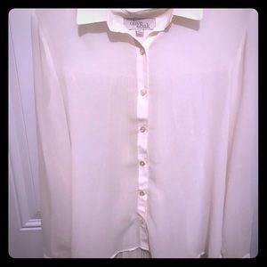 Flirty yet classic button down blouse